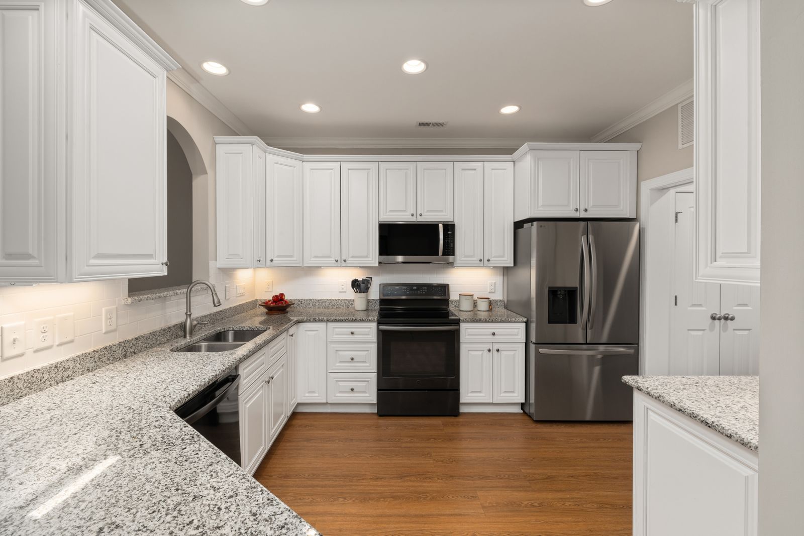 Period butler's pantry rebuilt as a working scullery with glazed upper cabinets